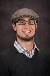 Photo of Luke Dempsey, Beach Museum of Art's Exhibition Designer and Technology Lead