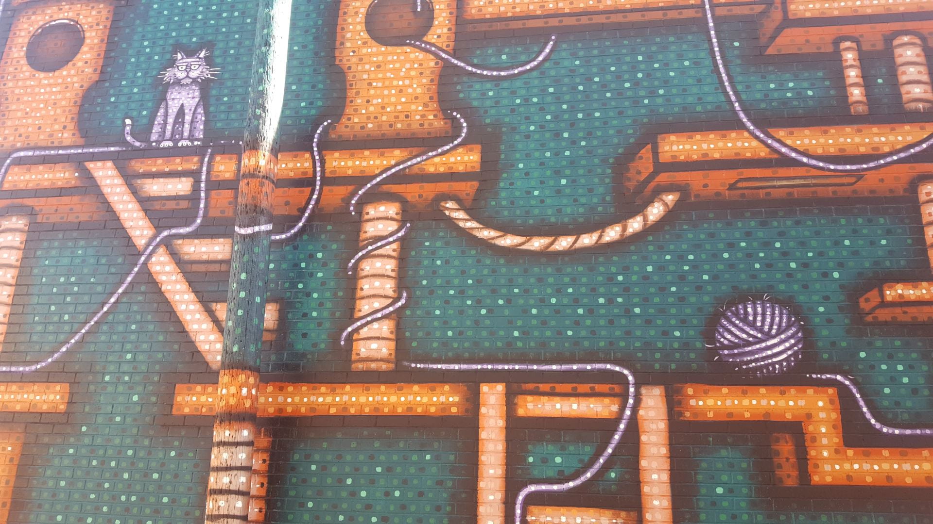 Detail photo of the mural painted by artist Nick Fisher, a.k.a. Sick Fisher. The mural is in downtown Manhattan, KS.