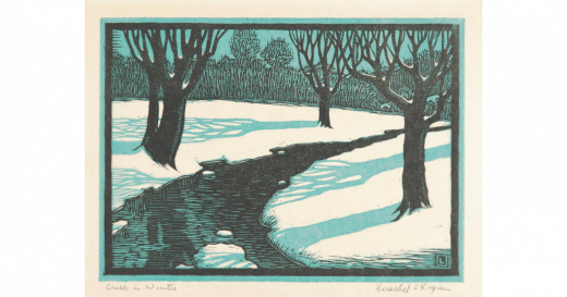 snowy banks of a winding creek bed