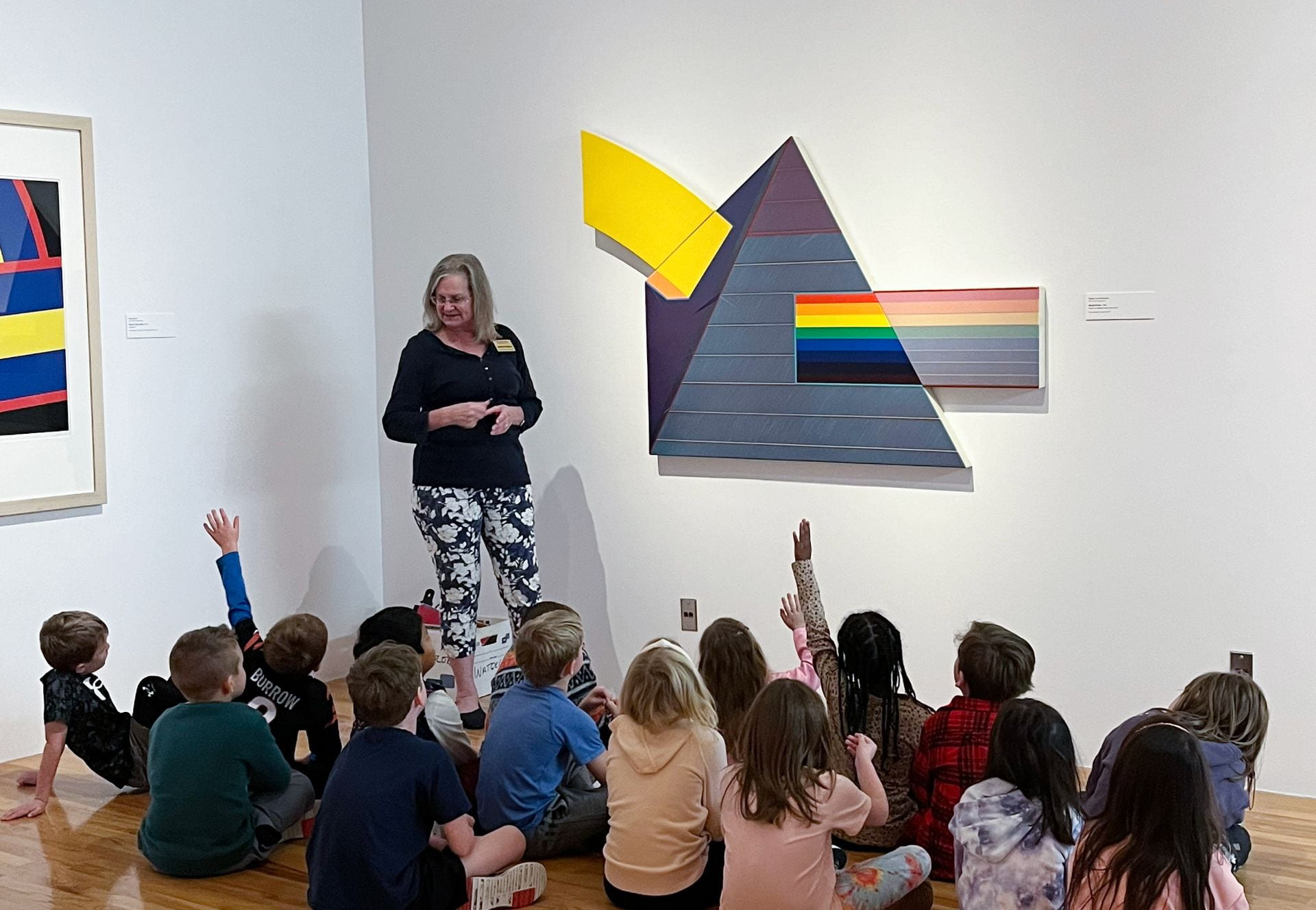 Kathrine Schlageck conducts a gallery education program with school-age children.