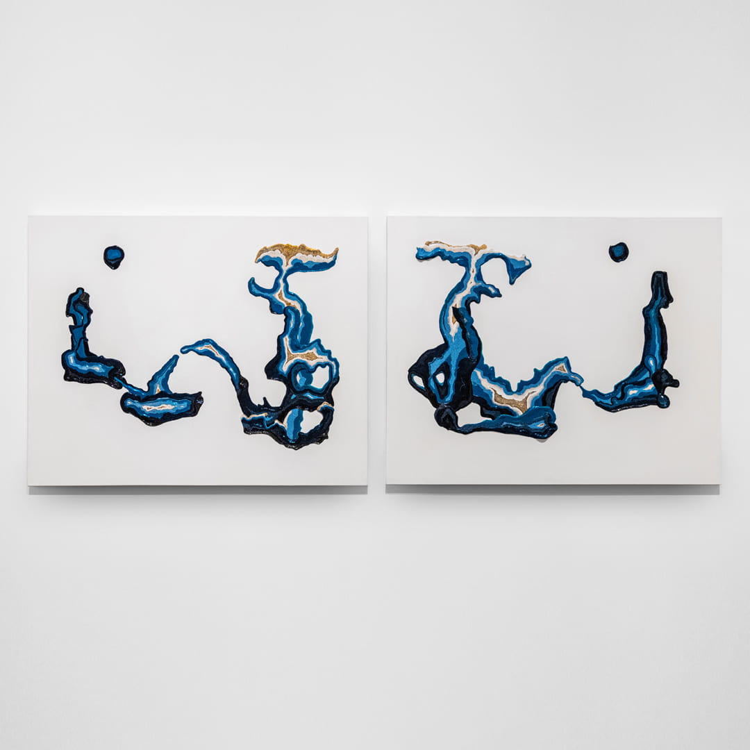 Several tiny beads stuck together on two canvases to create abstract shapes and topographical surface.