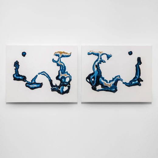 Several tiny beads stuck together on two canvases to create abstract shapes and topographical surface.
