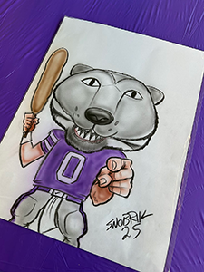 A drawing of Willie the Wildcat holding a corndog. 