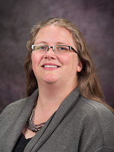 Alison Knoblauch smiles for a portrait. 