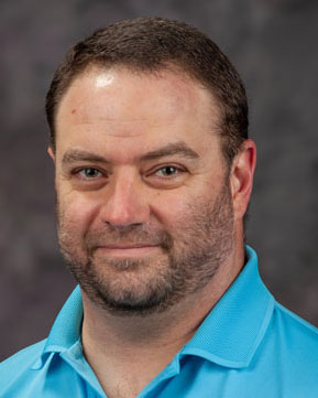 Portrait of Eric Figge in business attire 