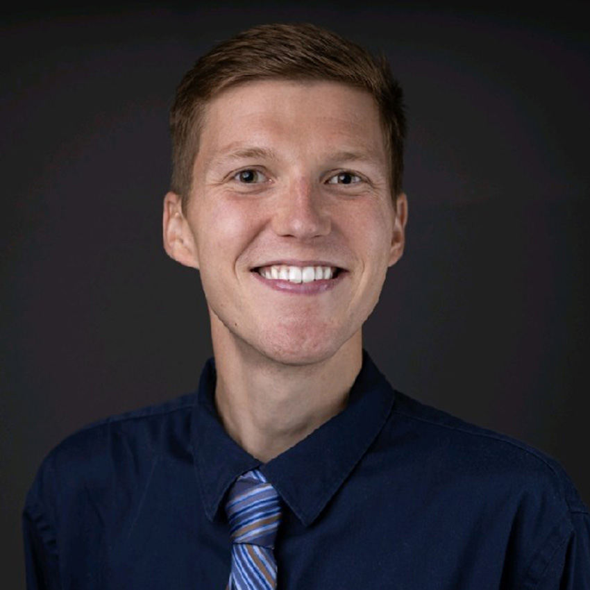 Jack Sytsma smiles for a professional portrait. 