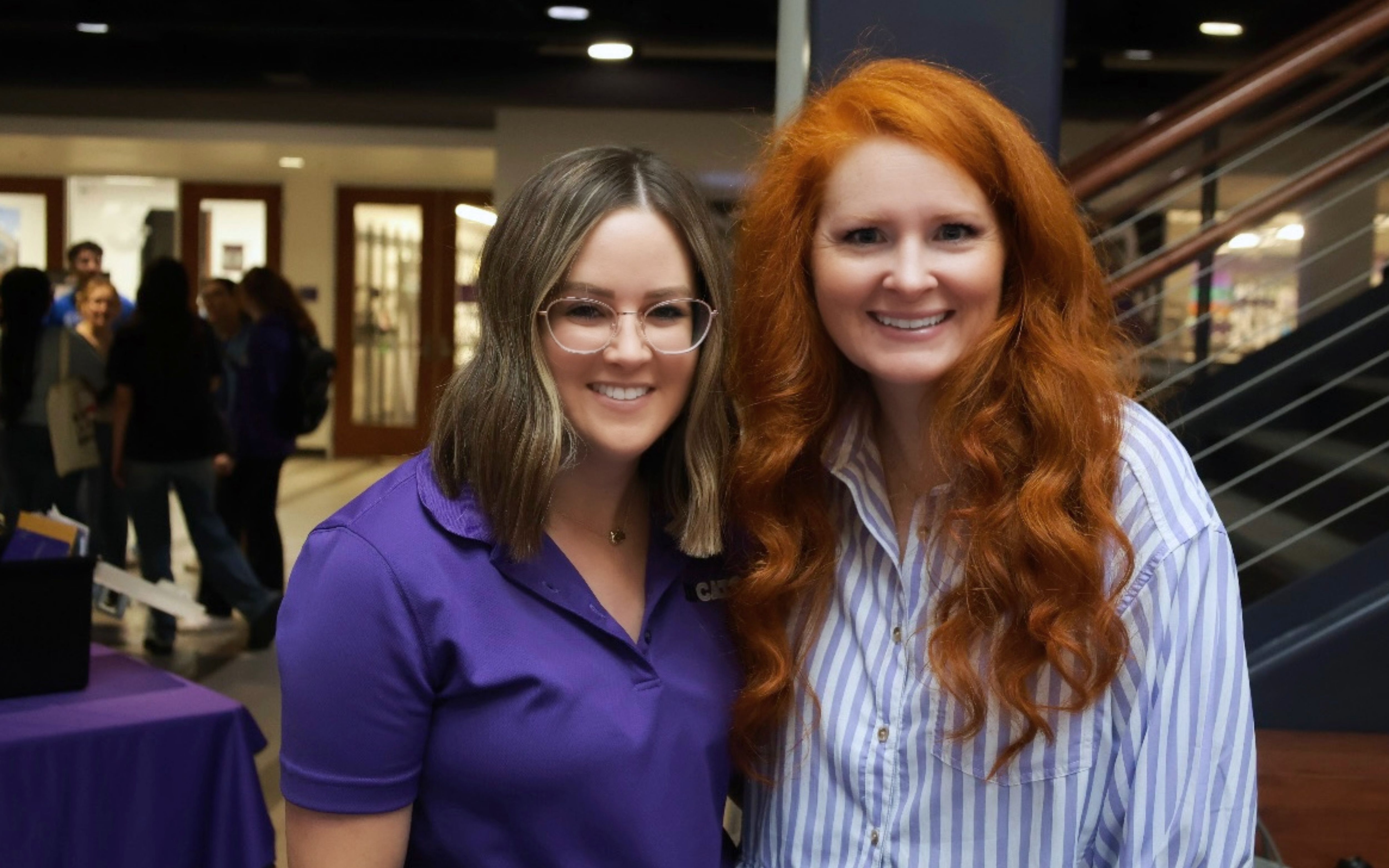 Kayln Hoppe and Tiffany Coetzee pose for a photo in the K-State Student Union.
