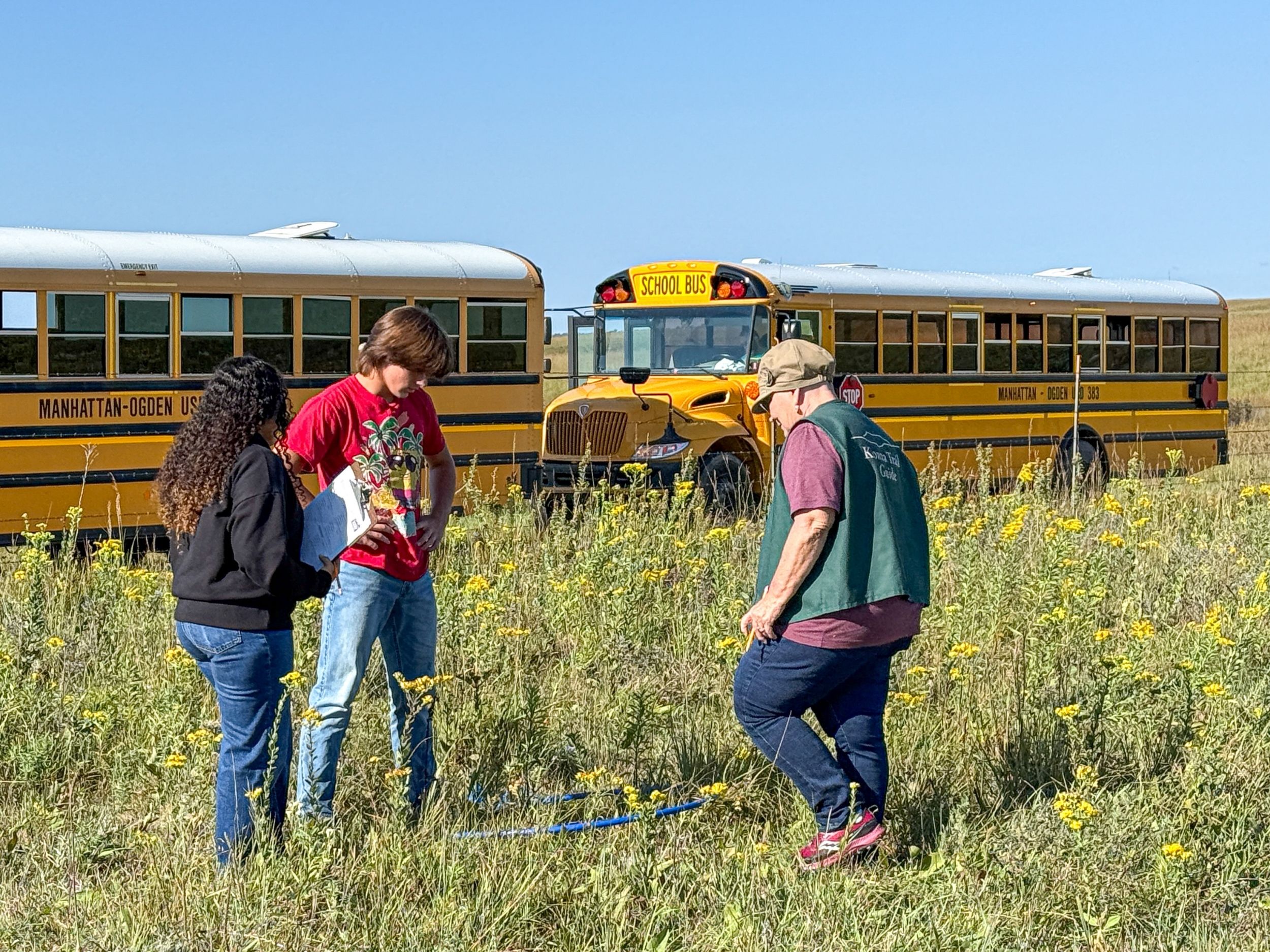 A K-State Konza docent speaks to Manhattan High School students