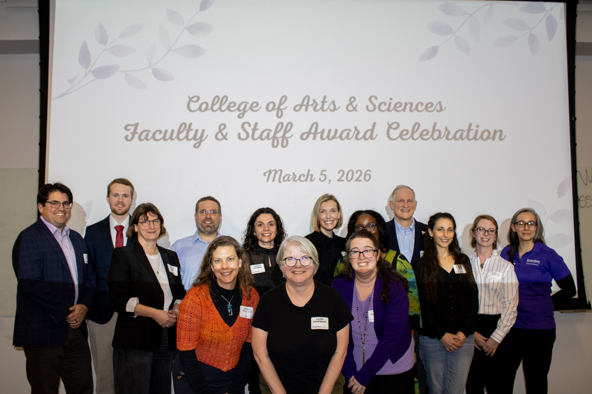 Faculty awarded during the Arts and Sciences faculty ceremony post for a photo