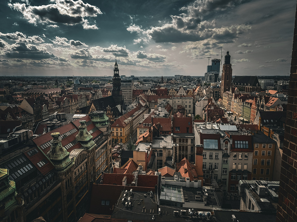 A view from a tall place of a Poland cityscape.