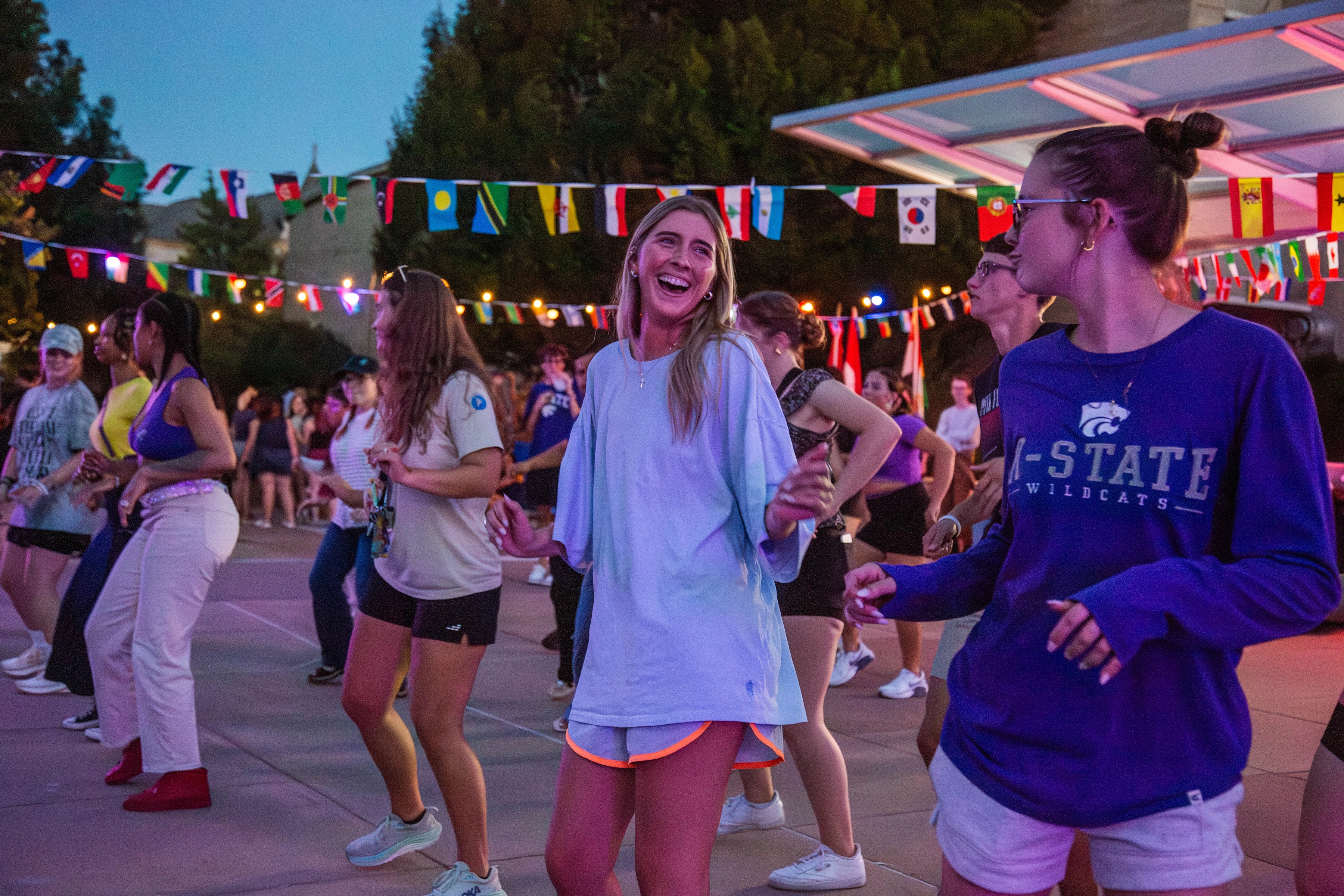 Students lined up dancing. 