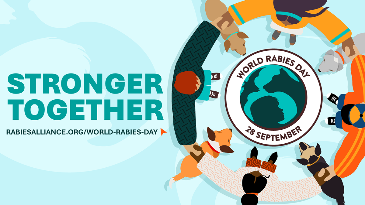 A banner says "Stronger together." A group of people circle around a logo that says "World Rabies Day 28 September." A website directs readers to www.rabiesalliance.org/world-rabies-day.