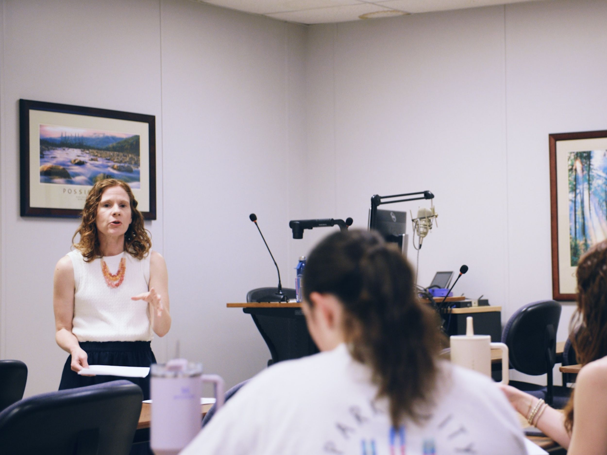Jessica Heier Stamm teaching at the front of a classroom