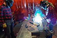 Students in Net Positive Studio Students in Kansas State University's Net Positive Studio work on assembling the zero energy home in St. John.