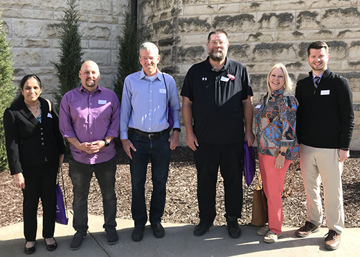 Sample A group of Kansas high school science teachers stand in front of a limestone wall. They include Sundara Ghatty, Josh Cochran, Eric Nelson, Carl Behrens, Rhonda Reist, Brian McCandless.