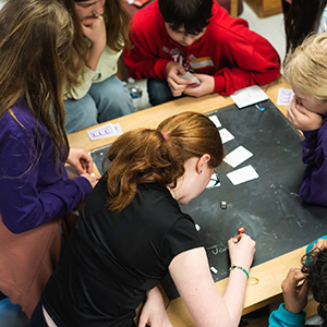 youth working at a table