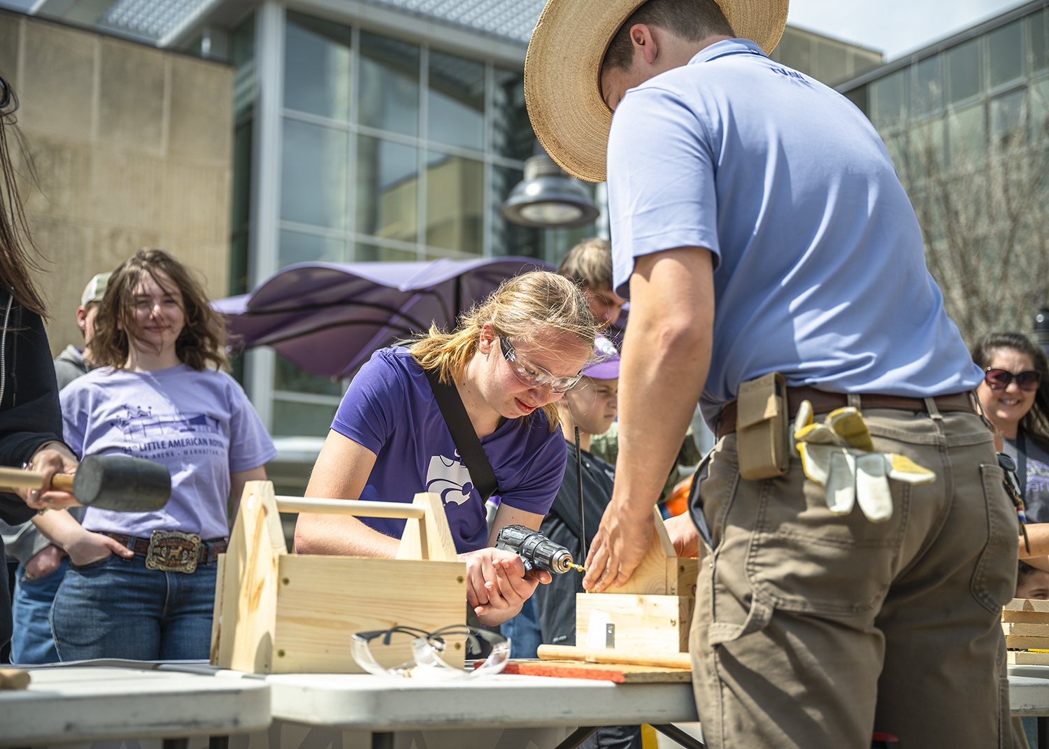 Open House People building toolboxes at K-State Open House