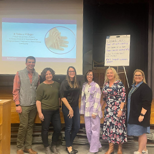 Members of a K-State research team meet with elementary school teachers at the Logan Intergenerational Family Education Center