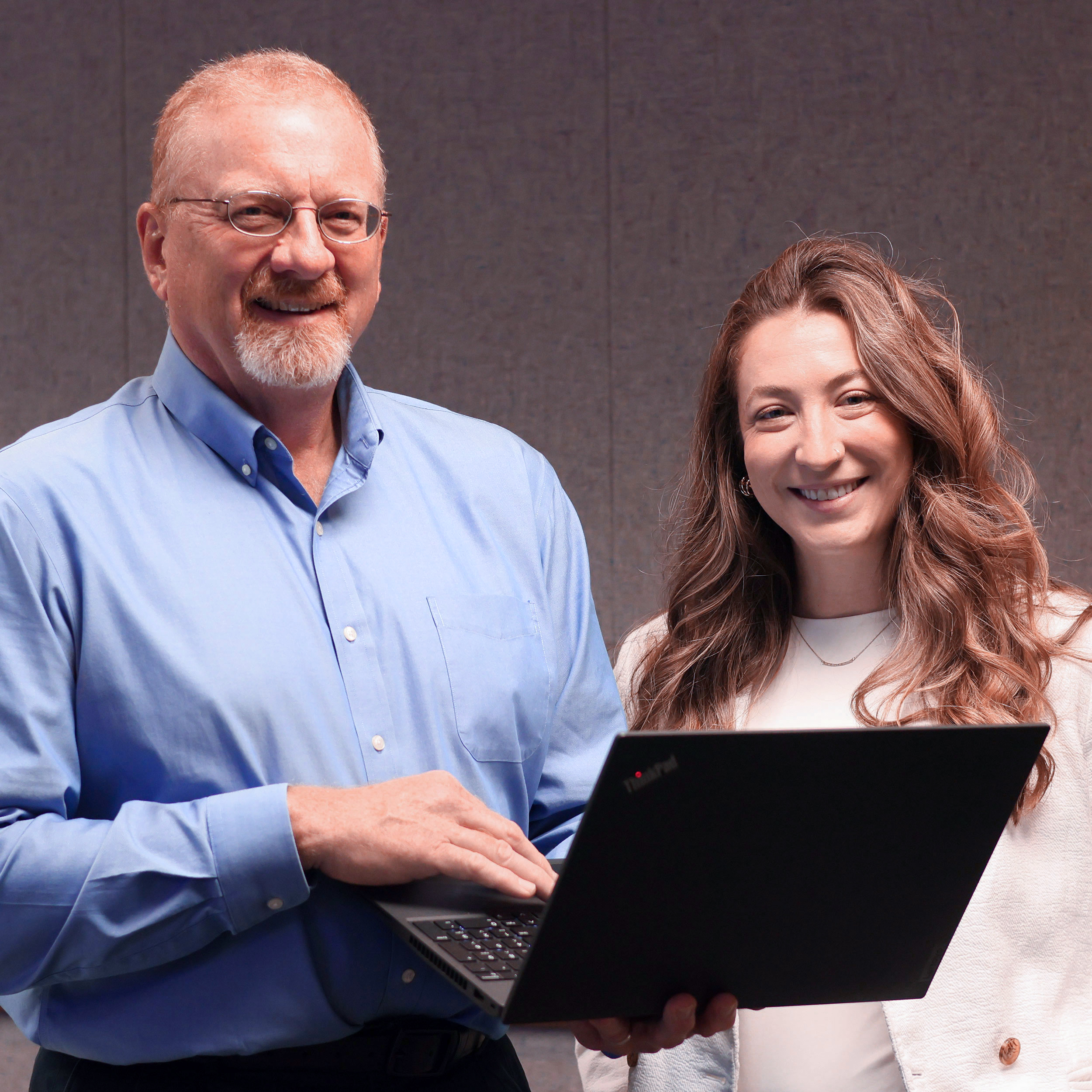 A portrait of Kansas State University veterinary medicine researchers Mike Apley and Eduarda Bortoluzzi.