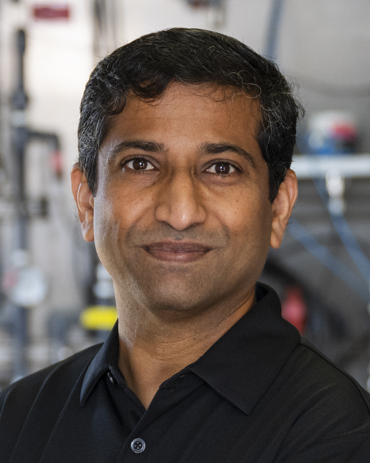 Prathap Parameswaran smiles for a portrait.