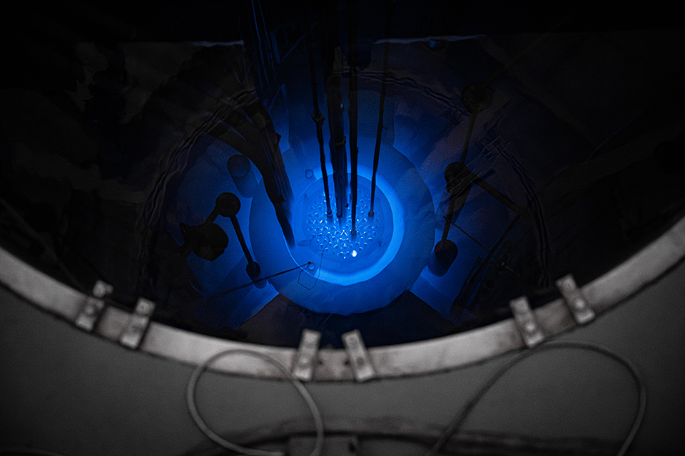 A top down view shows the pool for a nuclear reactor as well as the rim above it.