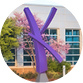 A purple K sculpture stands on the K-State Salina campus.