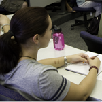 girl in classroom at desk