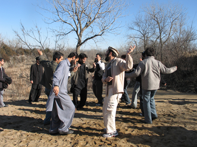 Pakistani men doing traditional dance