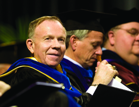 Wefald at commencement ceremony