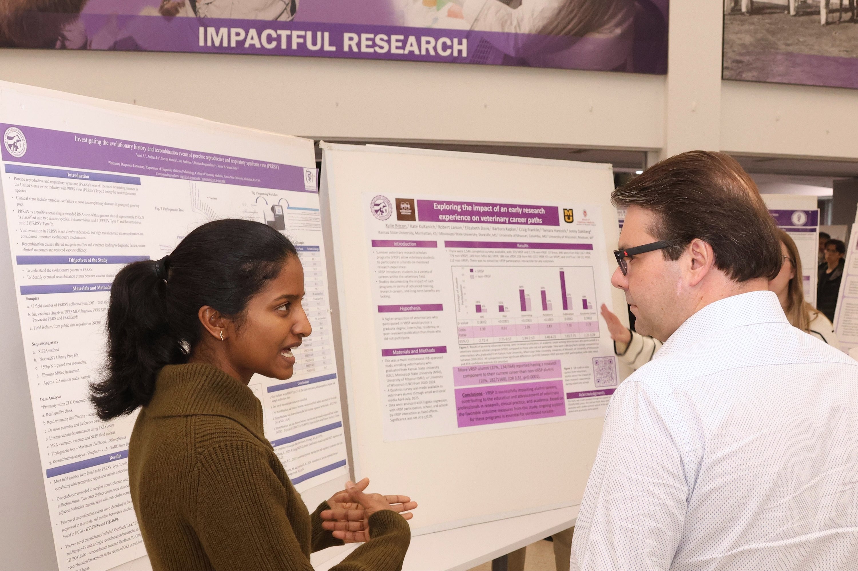 A student presents her research poster during the 2026 Phi Zeta Research Day