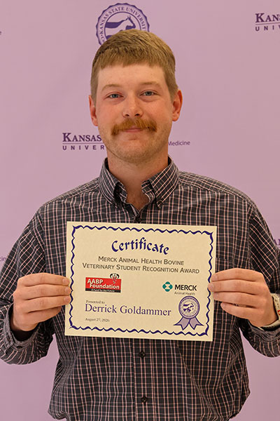 man holding certificate