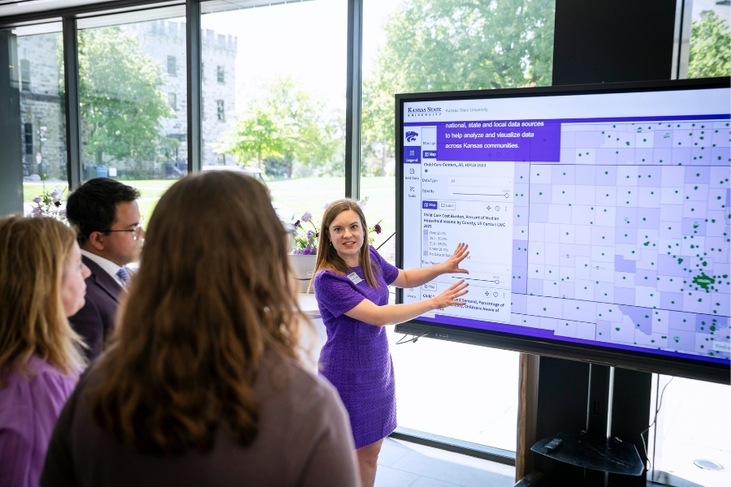 staff looking at a screen