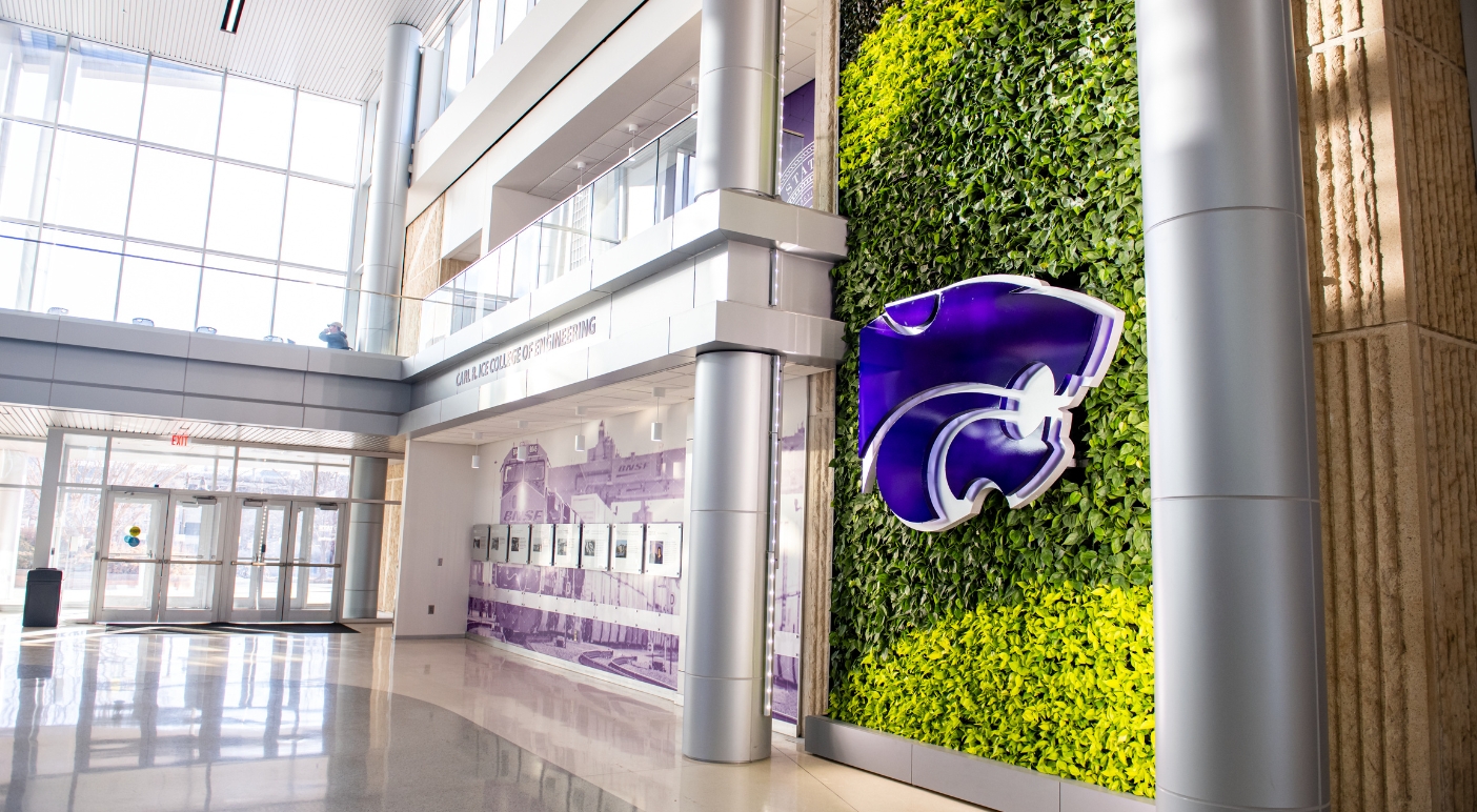 Professor in purple K-State Civil Engineering polo looking at the camera