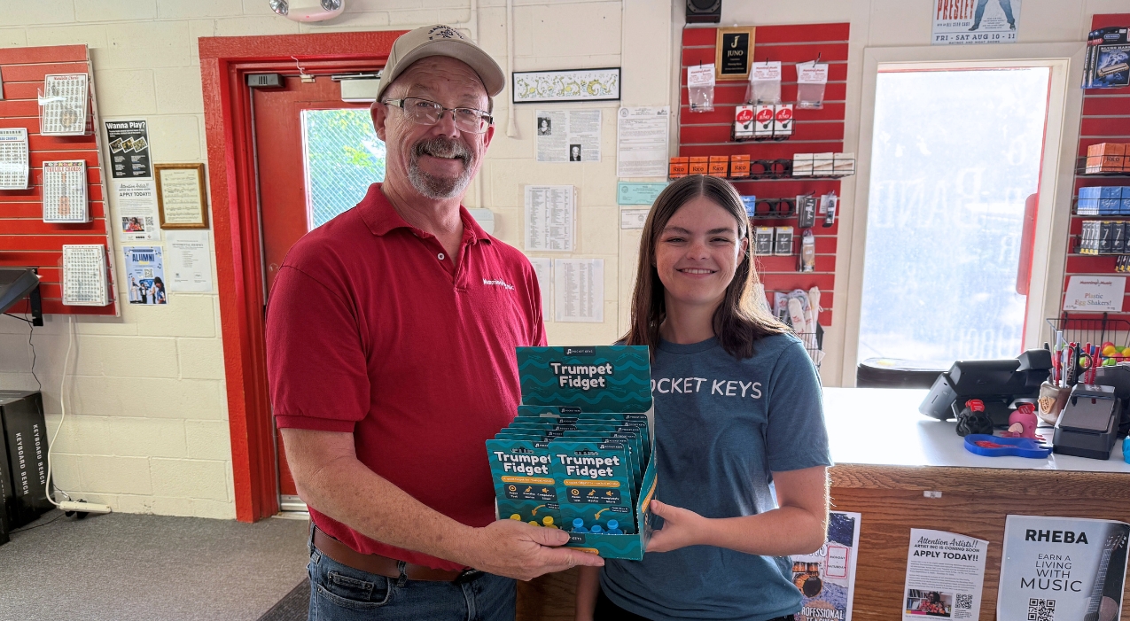 Emily Harmon, right, founder of Pocket Keys and creator of the Trumpet Fidget; and Todd Manning, owner of Manning Music, who is the first distributor of Harmon's product.