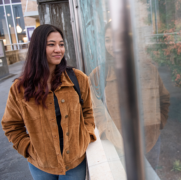 student on parking bridge