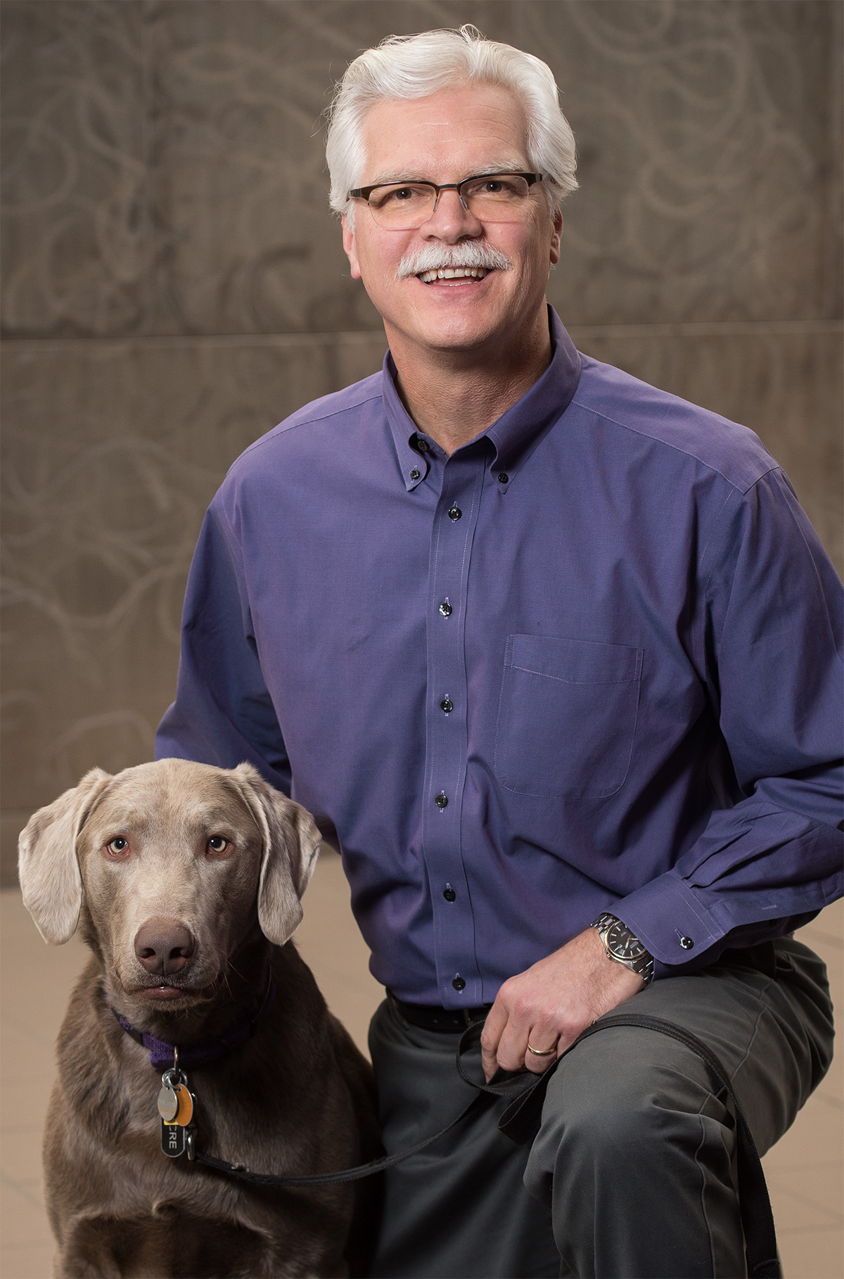 Greg Aldrich with his dog, Lucre.