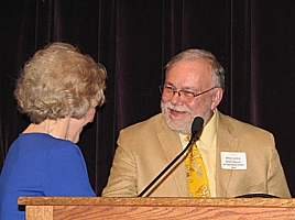 Mary Beth Kirkham congratulates Alfred Cochran