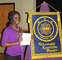Barbara Amoah displays her certificate