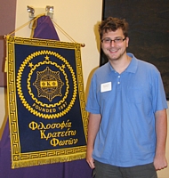 Connor Foley with banner