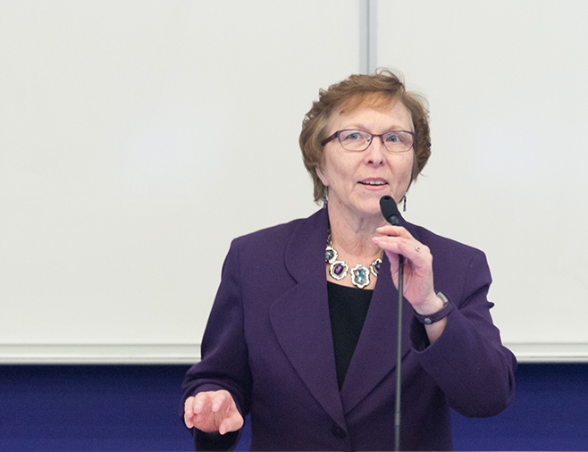 Dr. Carol Shanklin, Dean of the Graduate School, inducts graduate student members