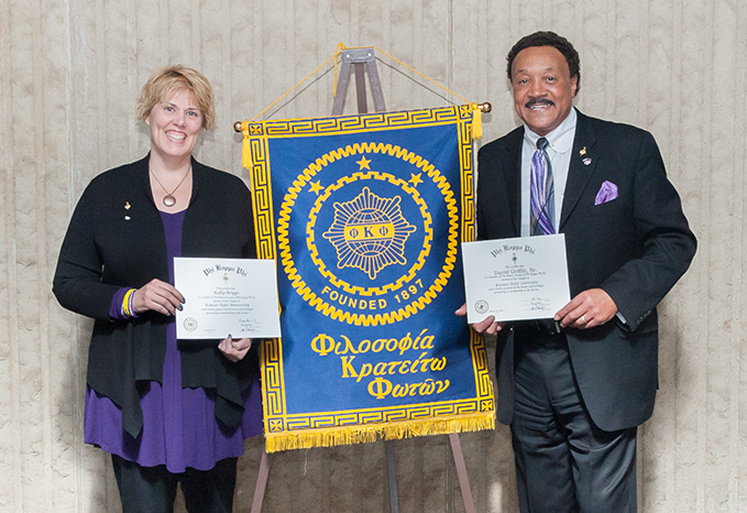 Graduate Initiate Kelly Briggs poses with Associate Dean David Griffin