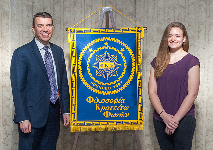 Assistant Dean Shannon Washburn poses with new initiate from the College of Agriculture 