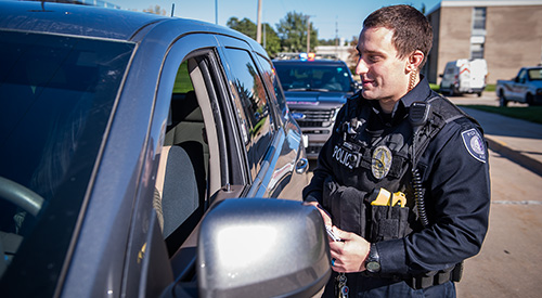 Police officer with driver