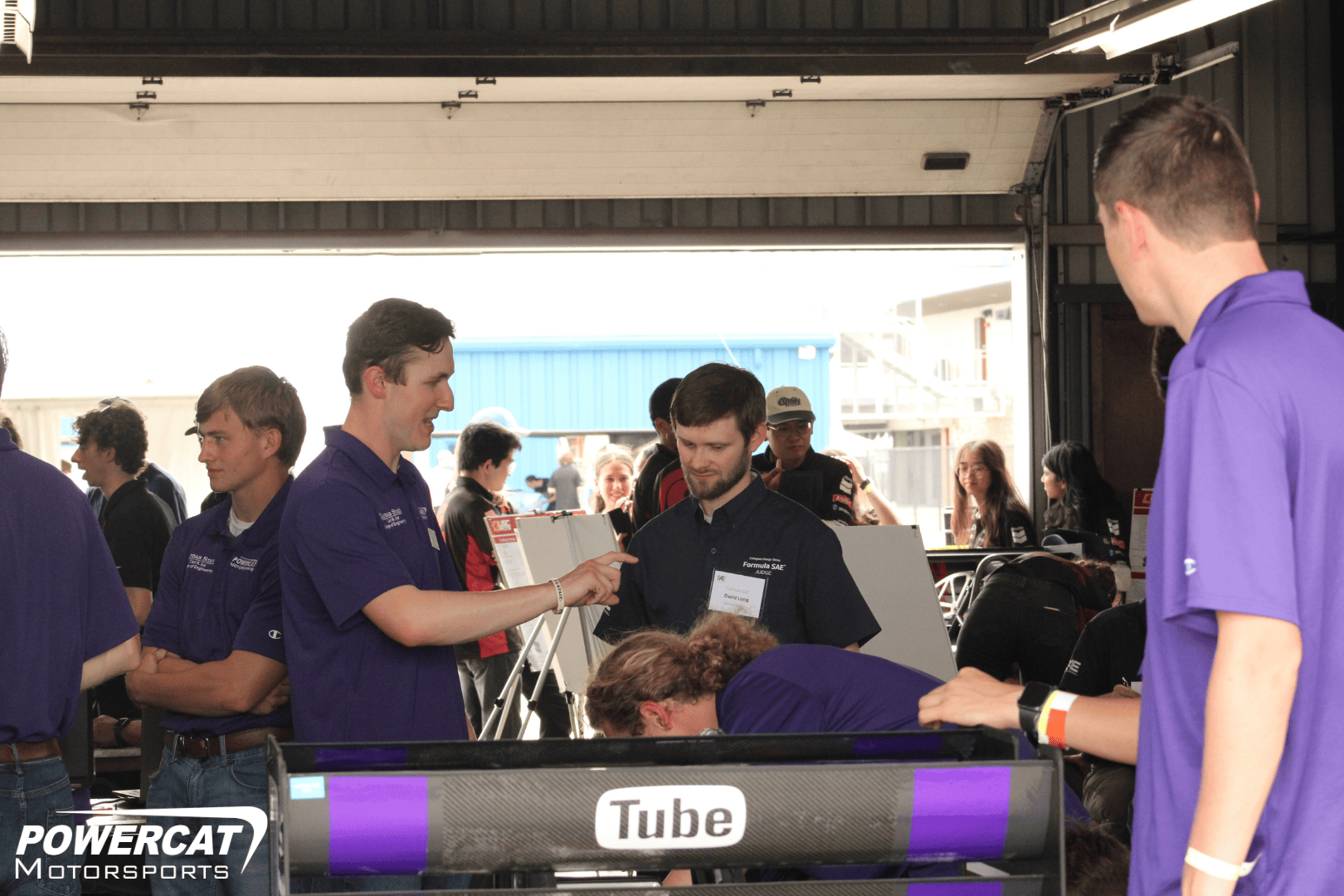 Tyler weber the aero lead explains his design to the aero judge