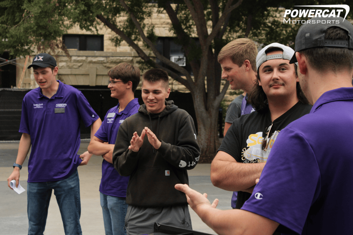 Mutliple team members talk to prospective students