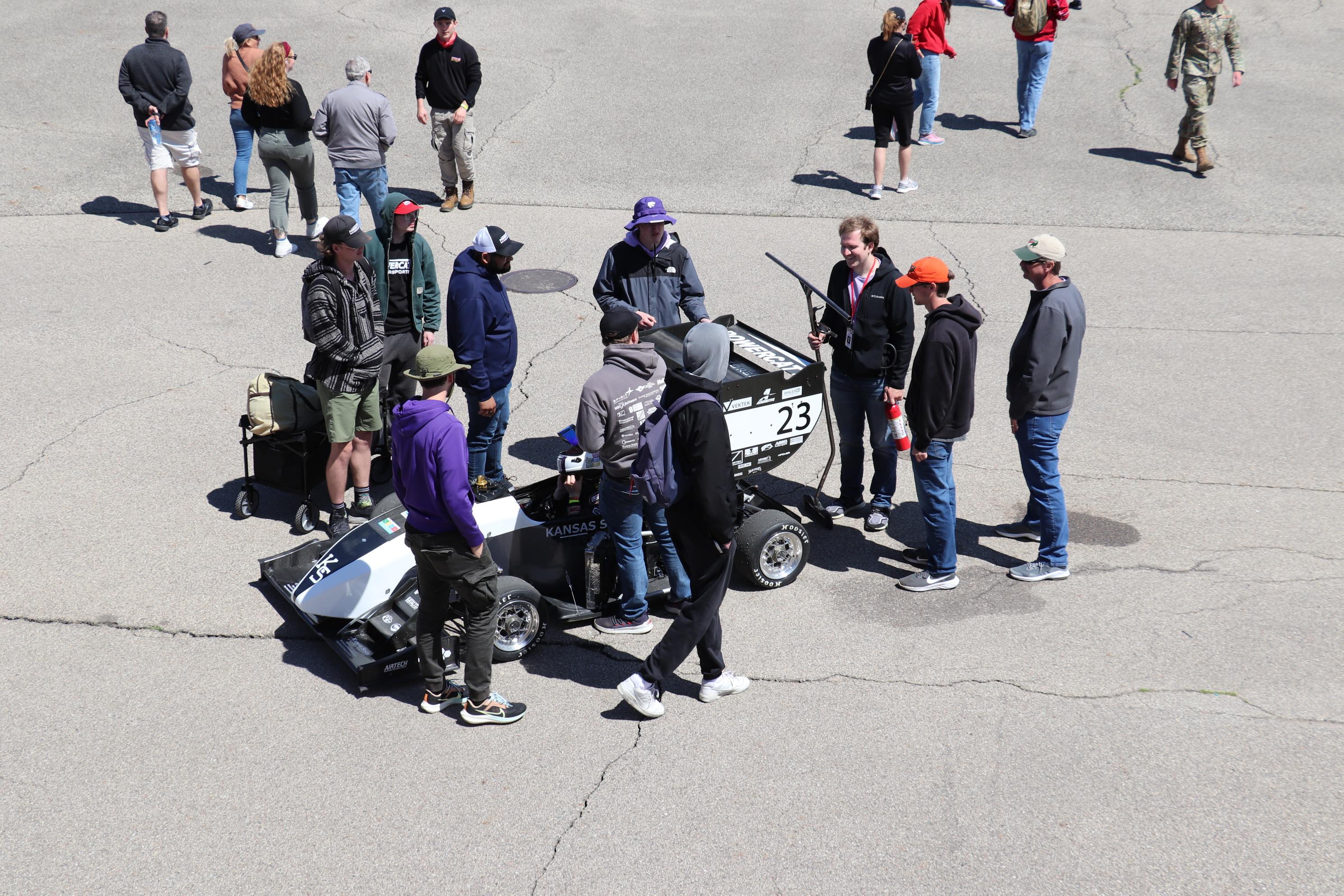 Some of our team by our car, Wyat our MVP is smiling