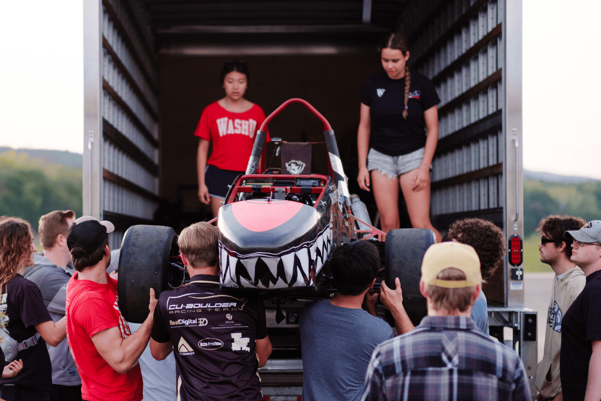 WASHu gets their car out of the trailer by hand