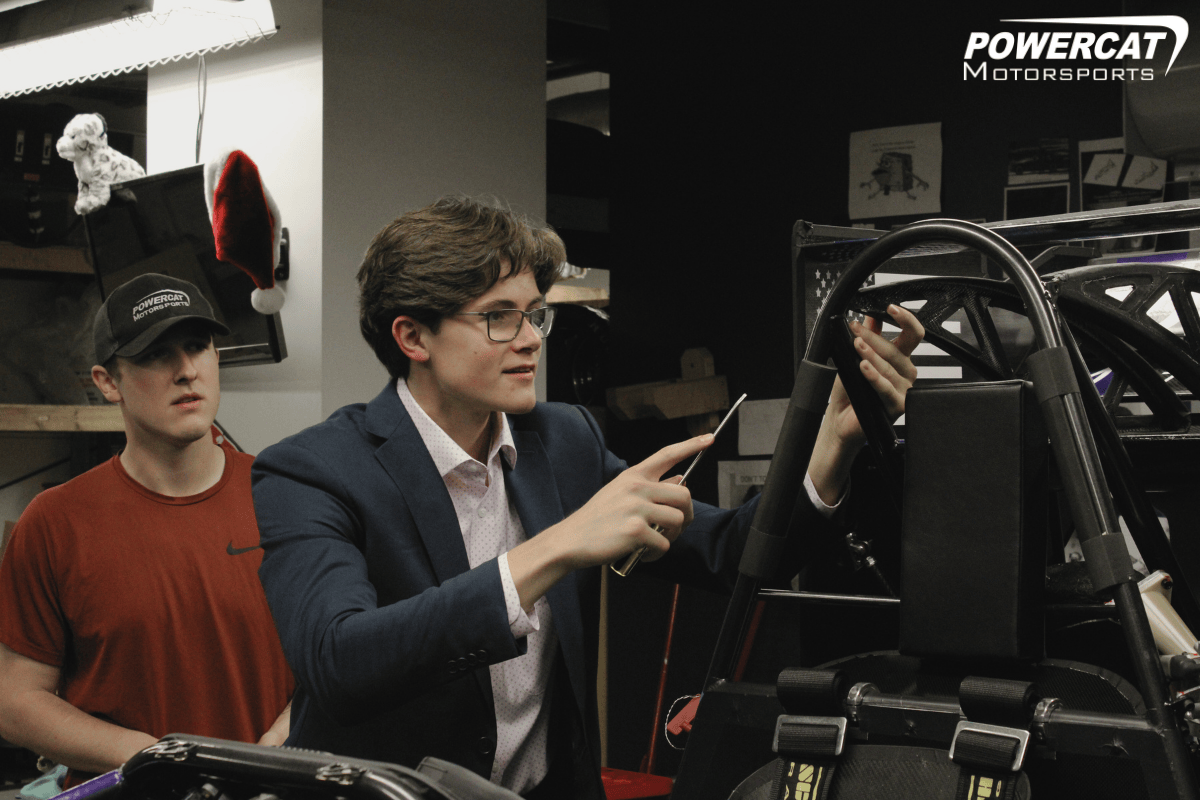 President tyler helps aero lead tyler put the rear wing back on  President tyler helps aero lead tyler put the rear wing back on