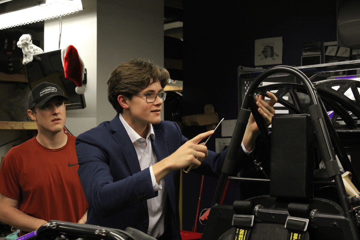 President tyler helps aero lead tyler put the rear wing back on President tyler helps aero lead tyler put the rear wing back on