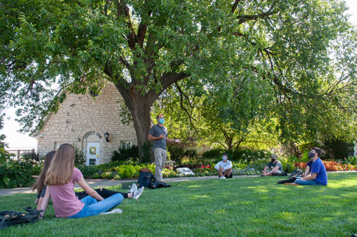 Professor Teaching Class Outside